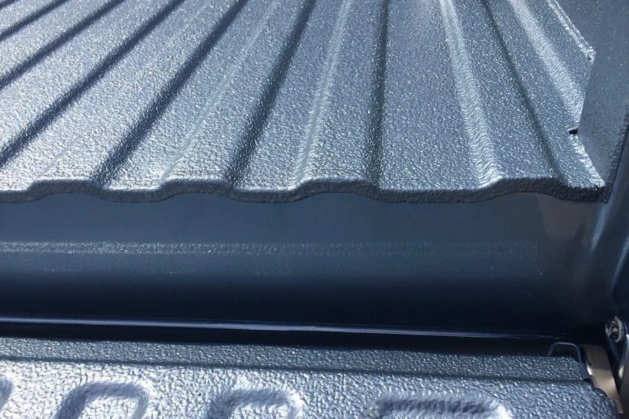 A close up of the bed rail on a truck