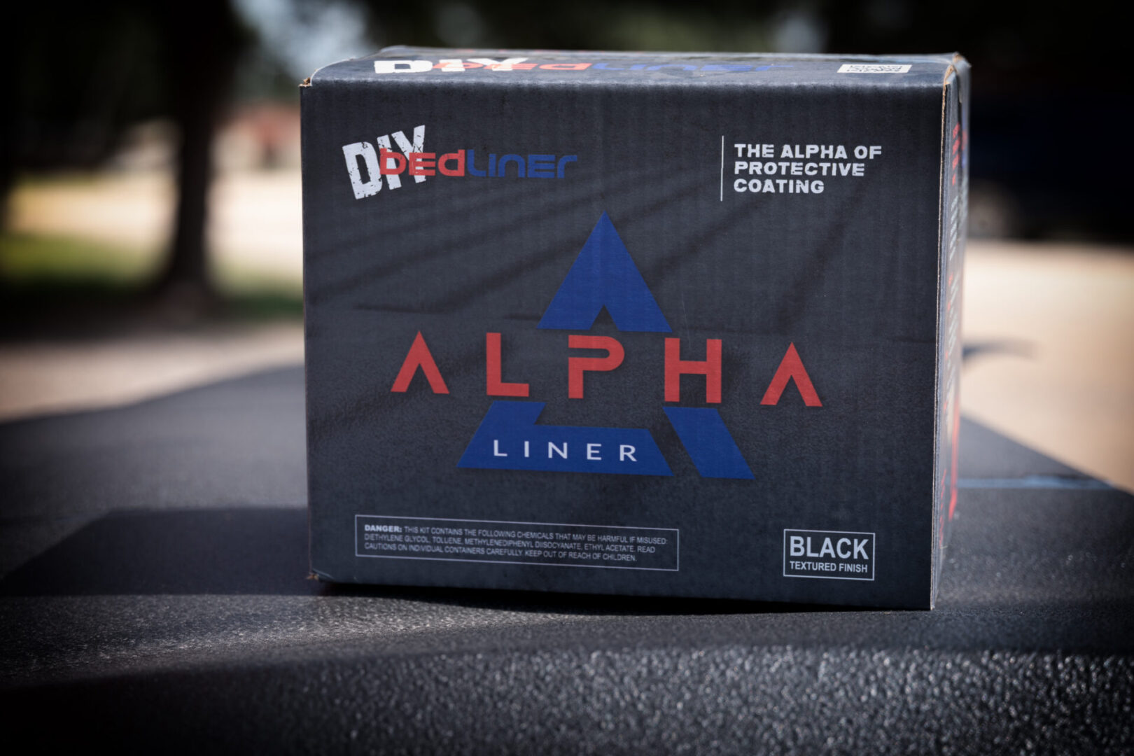 A box of black and red alpha liner